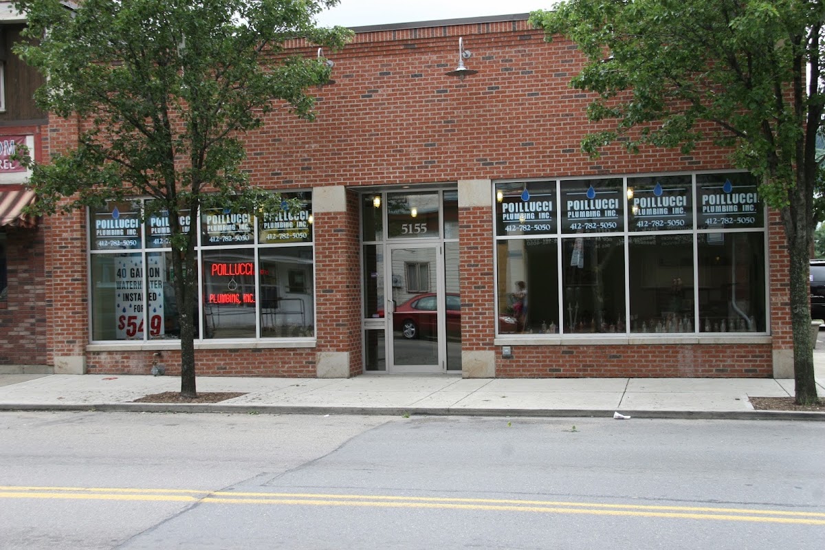 Poillucci Plumbing, Inc. storefront on Butler Street with painted window signage and phone number